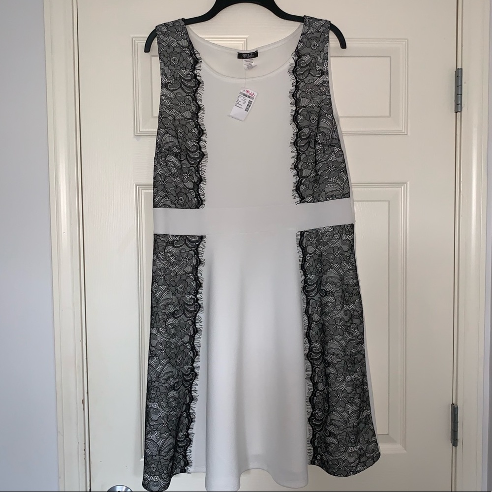 White with black lace outlines dress
